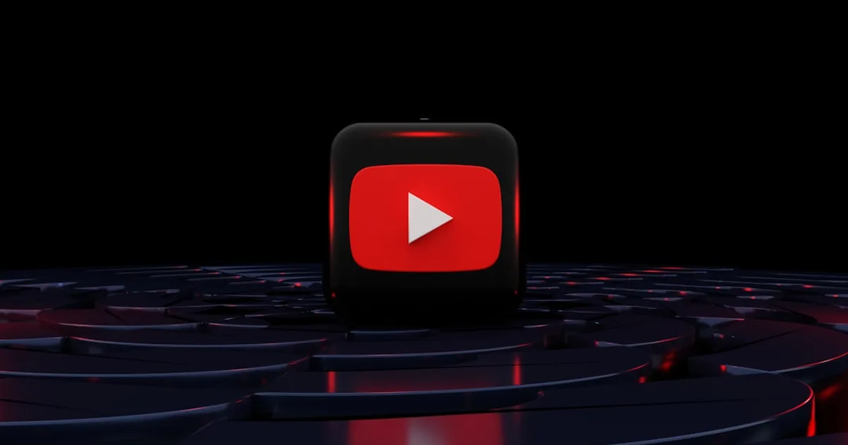 a red play button on a black background